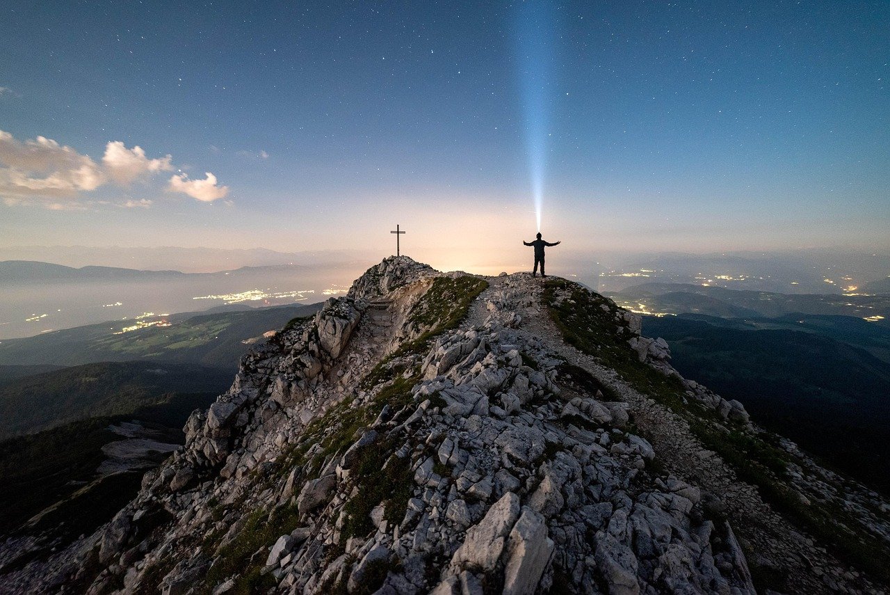 mountains, man, cross, stars, starry sky, universe, night sky, sky, galaxy, astronomy, space, science, shooting star, nature, evening, milky way, flashlight, headlamp, summit, long exposure